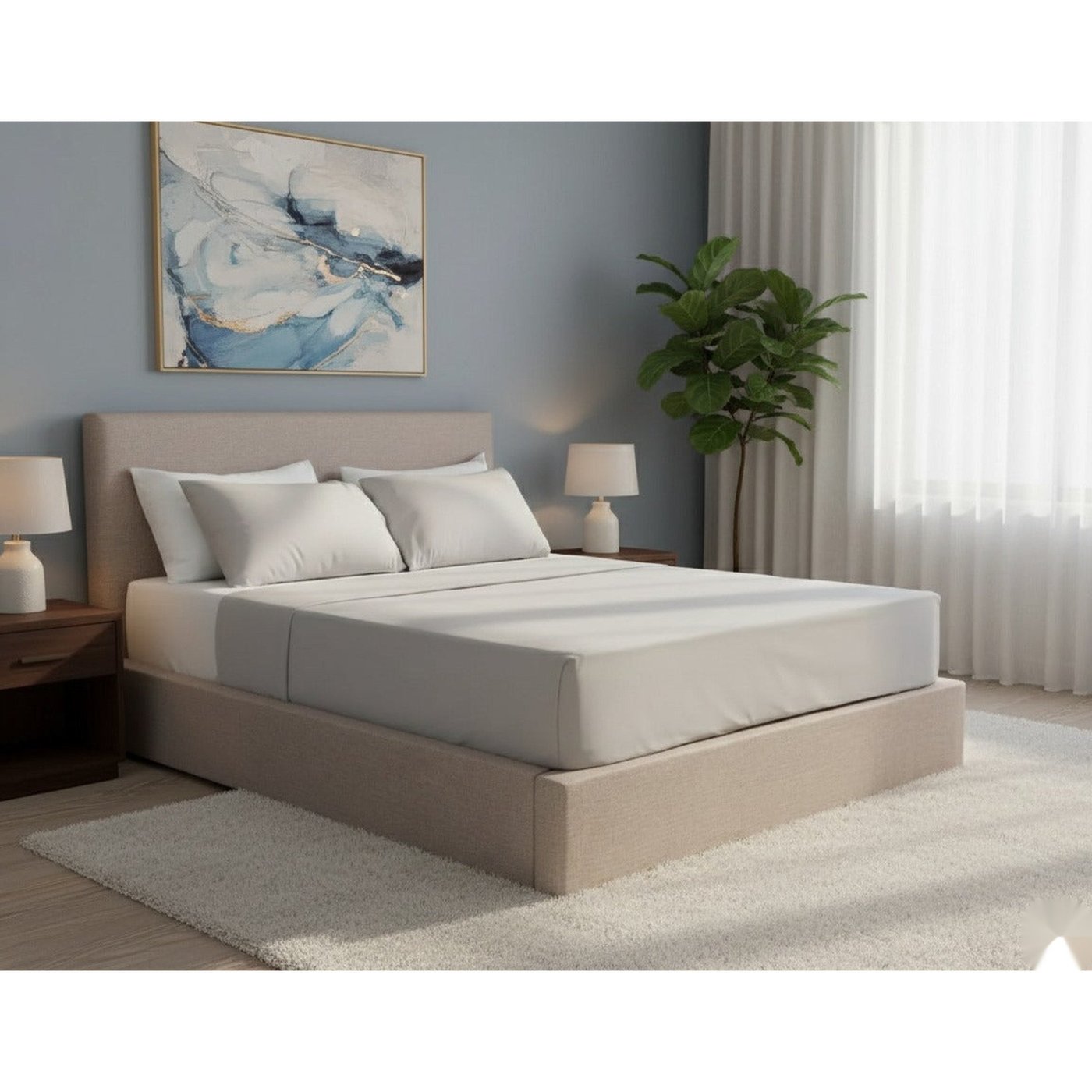 Styled bedroom with an upholstered bed, nightstands and lamps at the Innovative Furniture showroom